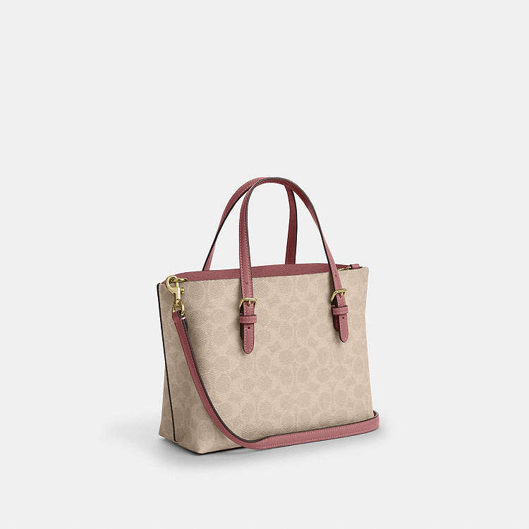 کیف دستی و کراسبادی کوچ مدل Mollie 25 با آویز قلب